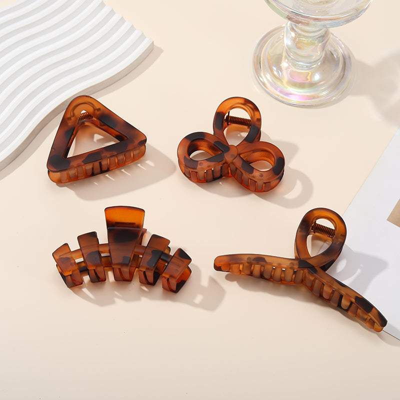 4 Pcs Amber - Patterned Hair Claws - Unique Shapes, Strong Hold & Trendy Design for Effortless Hairstyling